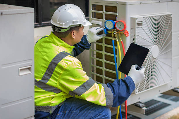 Professional Hvac technician working in Slovan, PA
